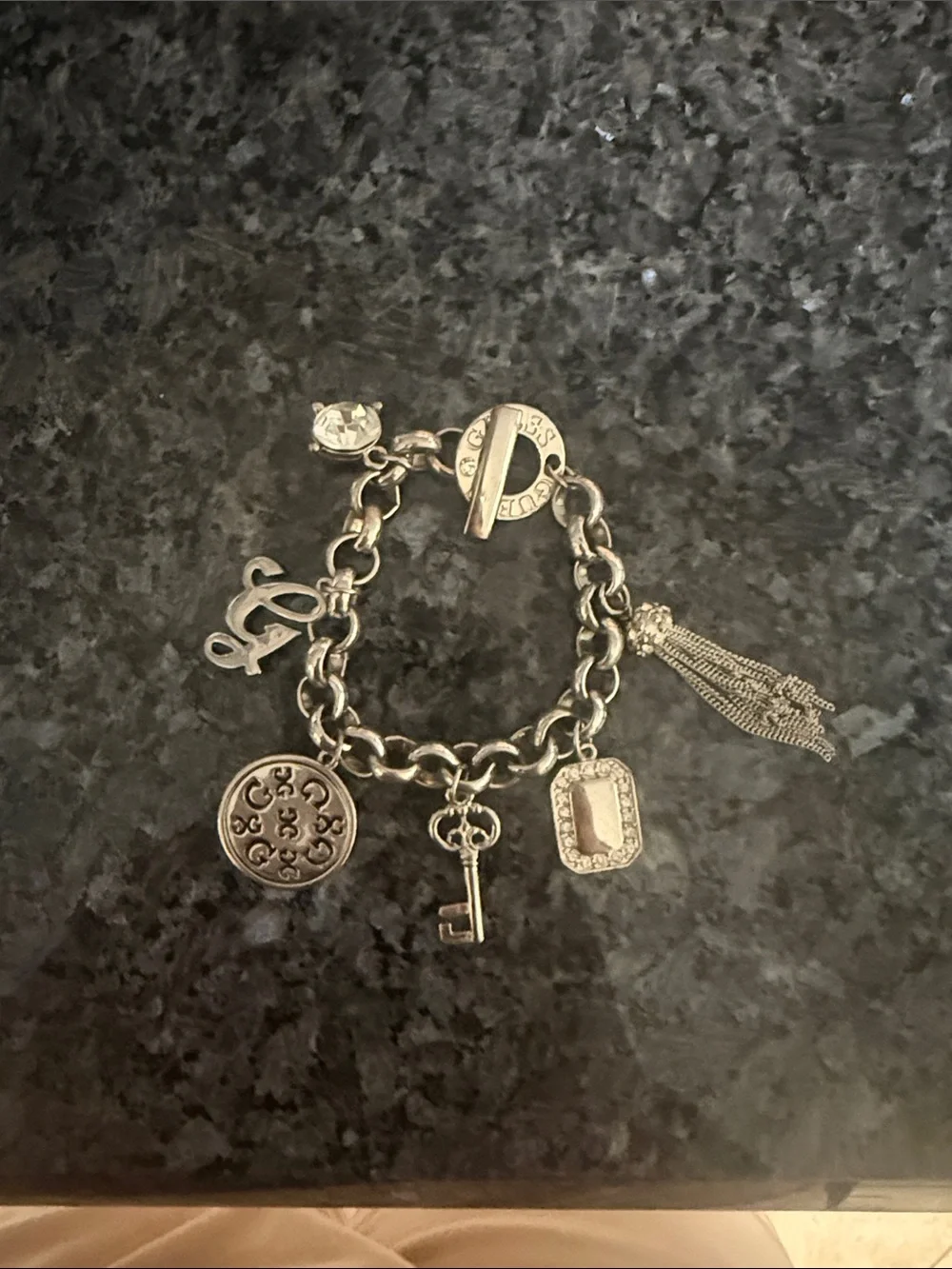 Silver Charm Bracelet with Key, Tassel & Crystal Accents